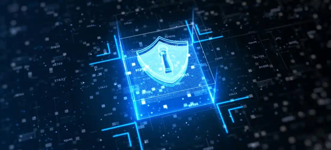 Futuristic digital shield with a keyhole symbol representing cybersecurity protection in a Manufacturing 4.0 environment. The glowing circuit board background emphasizes data security, encryption, and network protection for industrial and manufacturing systems.