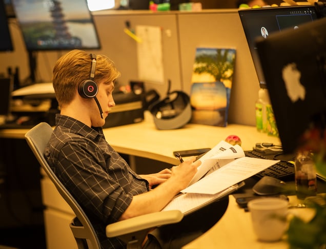 Lazorpoint team member working in office.