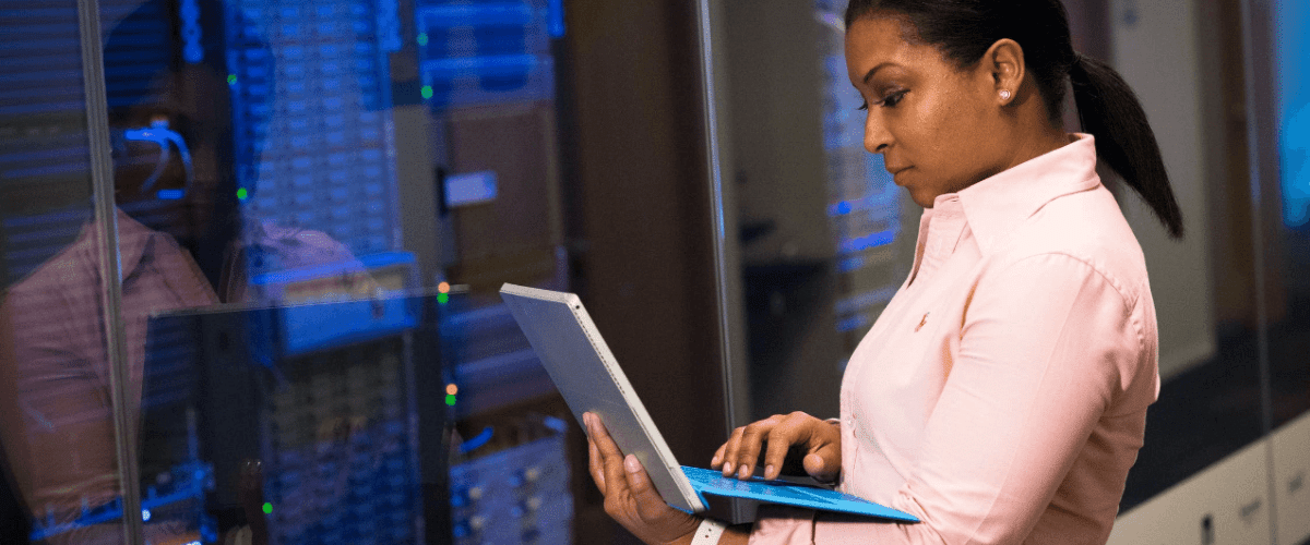 Woman working on server